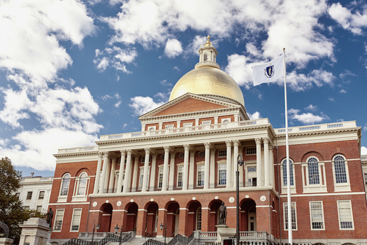 Although still present at the Massachusetts State House, city council buildings in some municipalities have opted to remove the state flag, a symbol that many have sought to update for more than 30 years. (Jen Lobo/Adobe Stock)