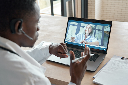 Telehealth visits and "smart scheduling" office visits can help patients keep up with care while staying safe from COVID. (insta_photos/Adobe Stock)