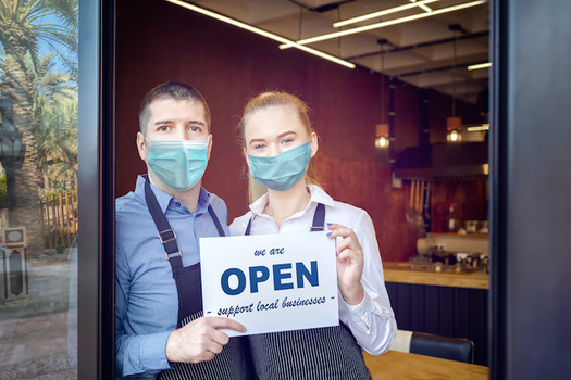 Does protecting businesses from liability for customers' COVID-19 infections excuse those who haven't made safety precautions a priority? Montana legislators are debating the issue. (DanRentea/Adobe Stock)