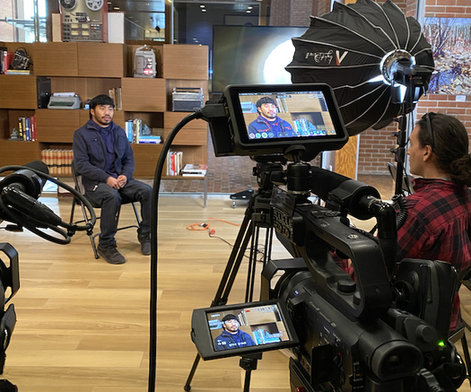 Student Shane White interviews Chris Balos, climate ambassador for the Marshallese Educational Initiative. (Pryor Center for Arkansas Oral and Visual History, University of Arkansas)