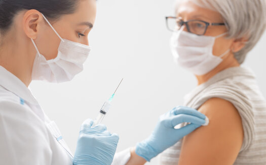 The state of Minnesota says so far, more than 400,000 residents have received at least one dose of the COVID-19 vaccination. As they complete the initial phase of health-care workers and group home residents, officials say more seniors will get their chance. (Adobe Stock)