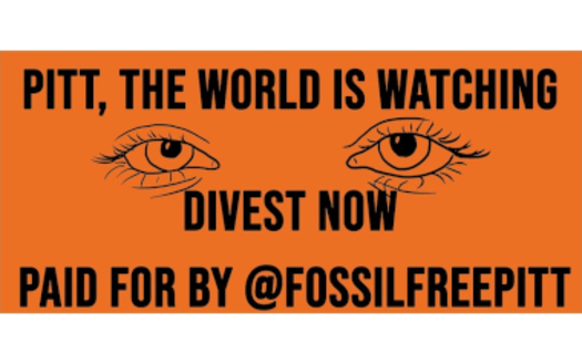 University of Pittsburgh students and allies unveil a billboard, which calls on the school's trustees to divest from fossil fuels. (Photo credit: FossilFreePitt)