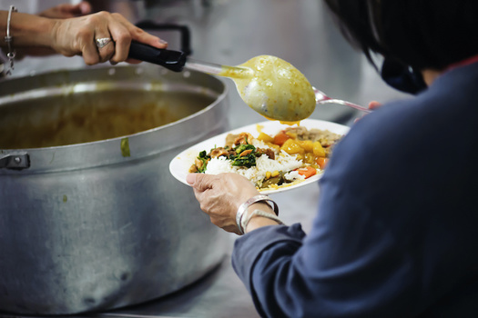 The number of people fed by New York City food pantries and soup kitchens last year increased by 65% over 2019. (kuarmungadd/Adobe Stock)