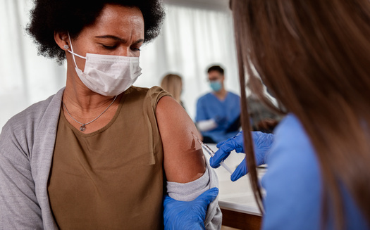 According to APM Research Lab, fewer than 9% of Blacks in the United States have received at least one COVID vaccination, compared with more than 16% of Caucasians. (Adobe Stock)