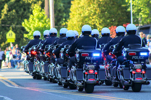 A coalition representing more than 14,000 police officers are giving the thumbs up to many reform efforts in Washington state. (Diego Gomez/Adobe Stock)