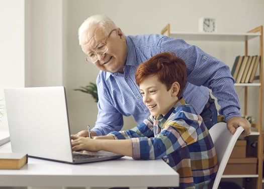 Students from multi-generational families who studied at home during the pandemic may be putting their grandparents at risk now that Arizona is returning to in-class studies. (studio romantic/Adobe Stock)