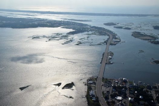 The view of water-surrounded downtown Swansboro, shown here in September 2019 at bottom right, reflects changes caused by Hurricane Florence a year earlier. (Mark Hibbs/SouthWings)