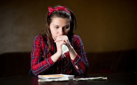 Those demanding a permanent federal paid family-leave policy say the pandemic has been especially hard on women. (Adobe Stock)
