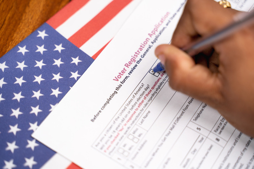Some lawmakers are hoping to see Maine join the 40 other states plus Washington, D.C., which have online voter registration. (Lakshmiprasad/Adobe Stock)