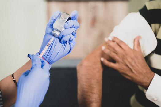 The COVID-19 vaccine is especially important for Oregonians 50 and older, who account for more than 95% of virus deaths. (Lakshmiprasad/Adobe Stock)