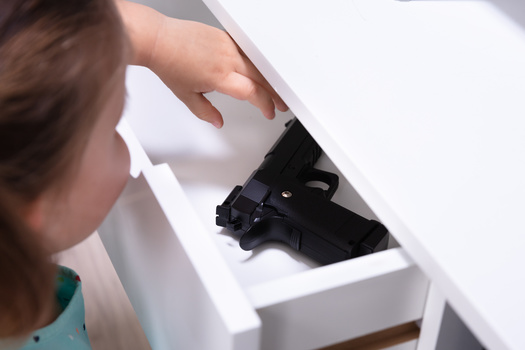 The American Public Health Association says 40% of gun-owning households with children store firearms unlocked, which contributes to the 2,700 children injured by gunfire and 110 fatal unintentional shootings every year. (Adobe Stock)