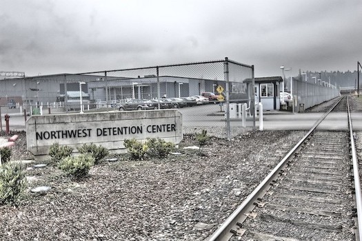 A measure passed in Olympia this session means the GEO Group-owned Northwest Detention Center will shut down when its contract expires. (Common Language Project/Flickr)