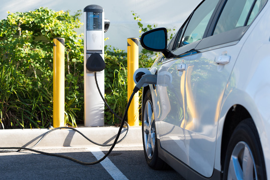 Ann Arbor is committing to a target of carbon neutrality within the next decade. The city currently has 135 electric-vehicle charging stations, including two that are free of charge. (Michael Flippo/Adobe Stock)