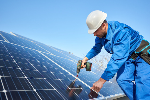 C-PACE financing can be used to install renewable energy sources like solar panels on commercial buildings. (anatoliy_gleb/Adobe Stock)