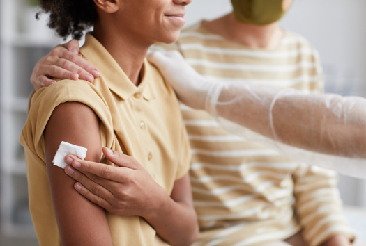 Massachusetts has launched efforts to reduce racial and socioeconomic disparities in vaccination rates, but while some communities' rates are through the roof, others still lag behind.  (Seventyfour/Adobe Stock) 