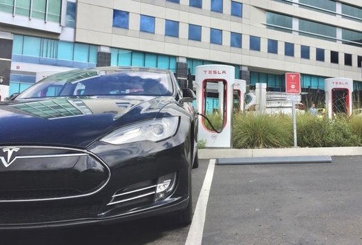 The infrastructure plan now before Congress includes funding to increase the number of E-V charging stations, such as this one at Qualcomm Stadium in San Diego. (Tonythetigerson/Twenty 20)