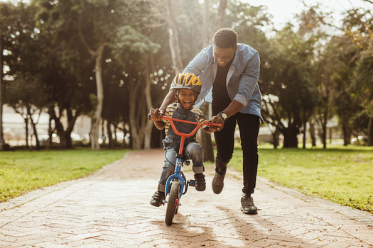 The expanded child tax credit is expected to send $1.8 billion to Kentucky families. (Adobe Stock)
