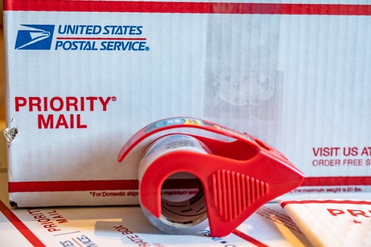 A Government Accountability Office report found in 2020, the U.S. Postal Service's package-delivery business generated $11 billion in revenues, but it wasn't enough to put the agency in the black. (Midwest/Adobe Stock)