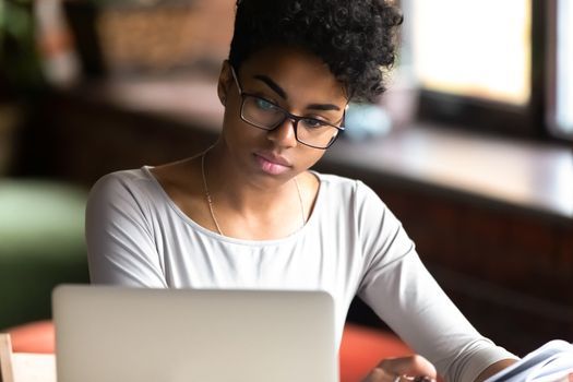 Black women carry roughly 20% more student debt than do their white counterparts. (Adobe Stock)