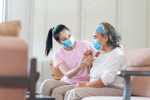 In the United States, home-care workers, mostly women and people of color, earn on average only $12 an hour. (Adobe Stock)