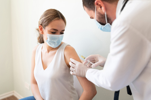 Nearly 70% of eligible Washingtonians have received at least one shot of a COVID-19 vaccine. (AntonioDiaz/Adobe Stock)