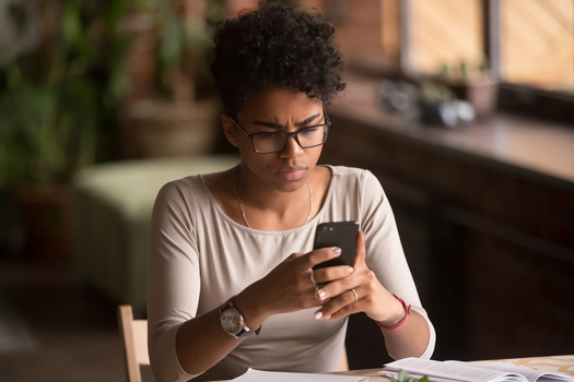 Almost half of all Black adults say they do not answer a call from someone they do not know, but two thirds report using the same or similar passwords across different accounts. (Adobe Stock) 