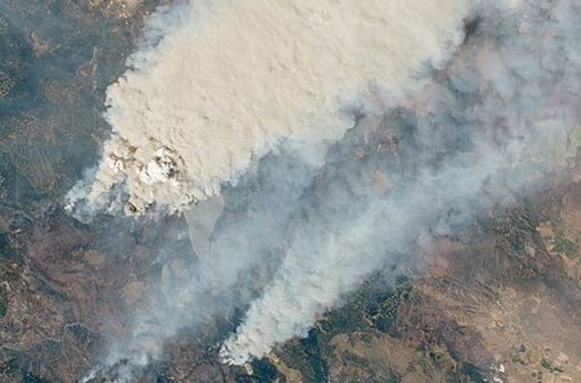 A new report predicts massive blazes such as the Dixie fire will become more common if the world fails to control carbon pollution. (NASA Earth Observatory)
