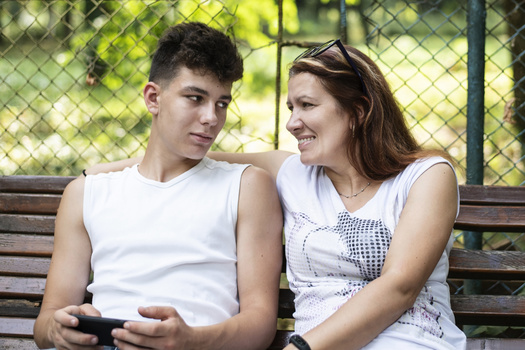 Allowing teens to voice their opinions and have make decisions builds trust, experts say.. (AdobeStock)