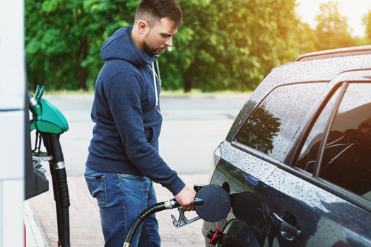 When drivers fill up their tanks in Massachusetts, they pay 24 cents per gallon to the state and a little more than 18 cents per gallon to the federal government. (blackday/Adobe Stock)