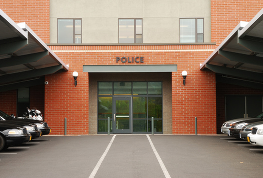 Police department parking lots and their video surveillance often are used as safe trading spots for people completing a transaction that began online. (Adobe Stock)