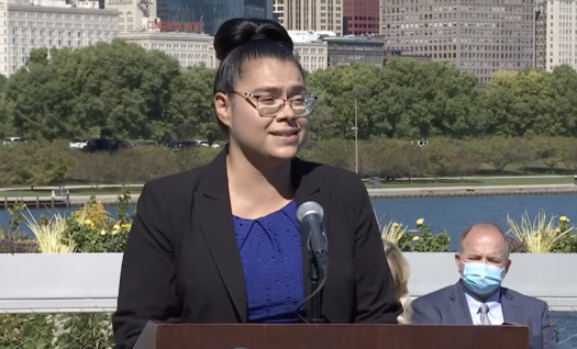 Dulce Ortiz of Clean Power Lake County was among those who spoke at the signing of landmark clean-energy legislation in Illinois. (Office of Gov. J.B. Pritzker)