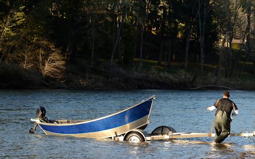 Anglers in the Columbia River Basin have been packing up earlier than normal this year. (ftfoxfoto/Adobe Stock)