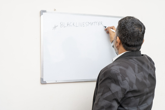 Under a proposed bill, Wisconsin schools would risk losing state aid if they taught certain concepts about racism. (Adobe Stock)