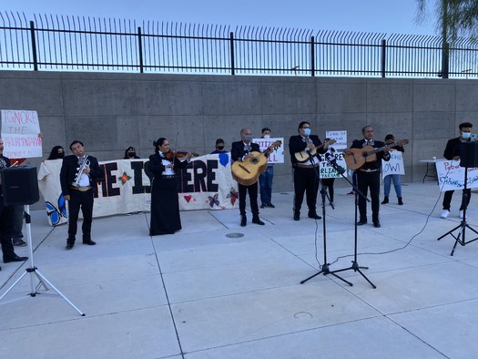 A mariachi brand entertains at the vigil on immigration reform Tuesday night in Las Vegas. (PLAN)