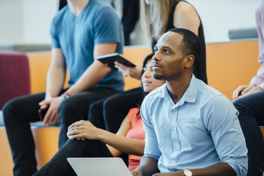 A new program aims to increase the number of adults of color attending community colleges by 2% nationally over the next two years. (Adobe Stock)