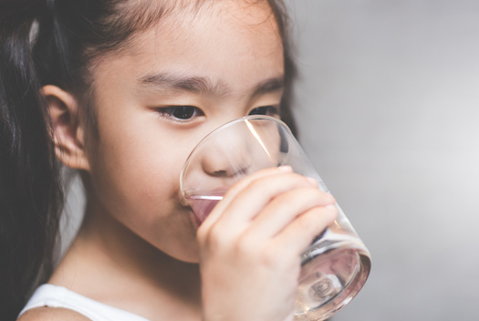 A 2020 report by the Environmental Working Group identified the presence of PFAS chemicals in the tap water of dozens of U.S. cities where contamination was not previously suspected. (Adobe Stock)