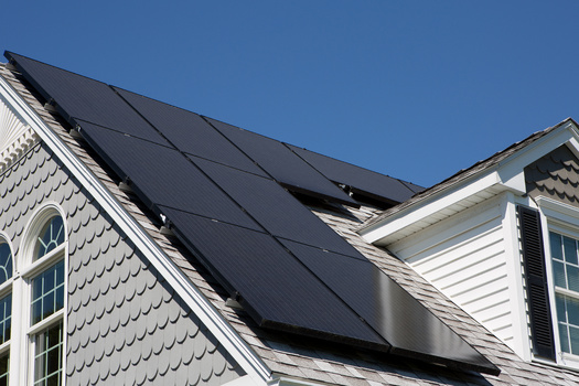 Advocates for rooftop solar say it will better localize the energy system, making it more resilient. (kmlPhoto/Adobe Stock)