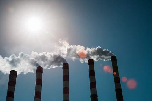 Cutting greenhouse-gas emissions as part of an effort to slow climate change also reduces air pollutants, such as fine particulate matter, that harm human health, according to the National Institute of Environmental Health Sciences. (Adobe Stock)