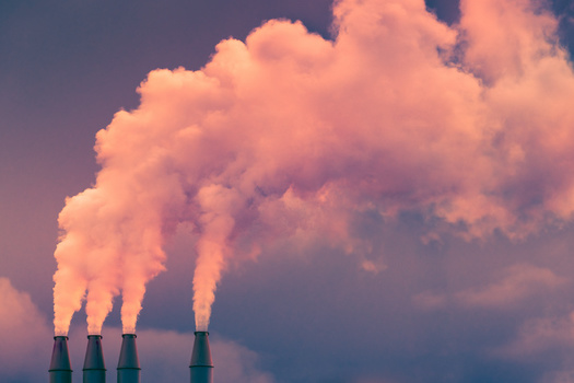 Cutting greenhouse-gas emissions as part of an effort to slow climate change also reduces air pollutants, such as fine particulate matter, that harm human health, according to the National Institute of Environmental Health Sciences. (Adobe Stock)
