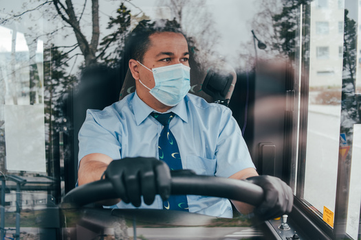 Education Support Professionals, such as bus drivers, have been celebrated during American Education Week since 1987. (nadorozhna.uliana/Adobe Stock)