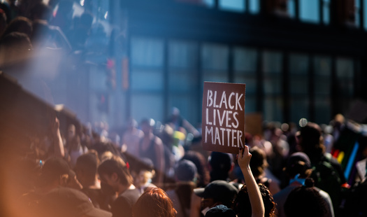 Anti-racism groups in Iowa say initially after George Floyd's murder, they saw promising state-level policies to address police accountability. But they contend that approach quickly changed with laws they believe make it harder to protest. (Adobe Stock)