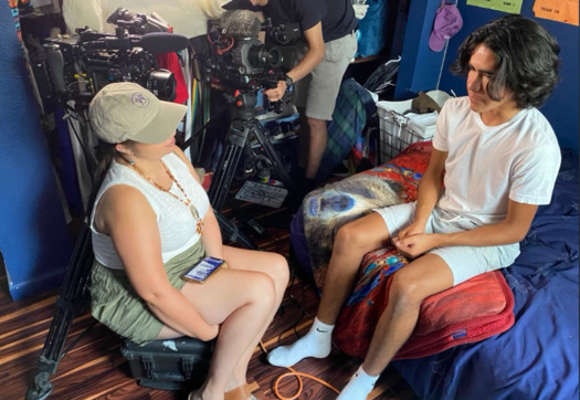 Paige Bethmann and Ku Stevens speak in between interviews at his house on the Yerington Paiute Reservation in Nevada. (Zack Kiszka)