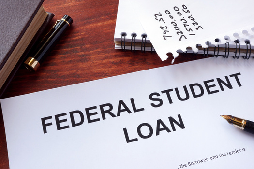 More than one in four people in a recent survey said when payments resume in February, they'll be paying at least one-third of their income toward student loans. (Vitalii Vodolazskyi/Adobe Stock)