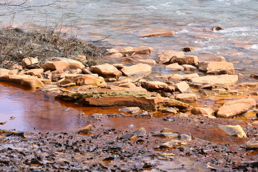 An estimated 5,500 miles of Pennsylvania streams have been polluted as a result of abandoned-mine drainage, according to the state Department of Community and Economic Development. (Adobe Stock)