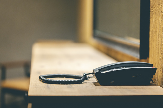A body of research has found frequent family visits and family phone calls to someone who's incarcerated not only reduces recidivism, but also strengthens family relationships. (Adobe Stock)