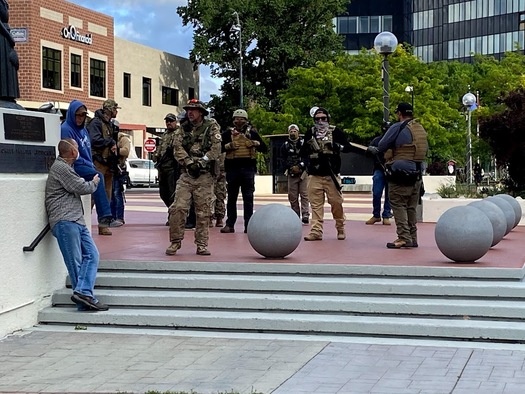 Men in militia-style dress gather in downtown Reno after a Black Lives Matter event in 2020. (Anthony Shafton)