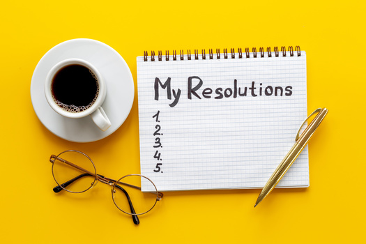 Following through on new year's resolutions can be daunting, but changing one's mindset can be key to attaining them. (9dreamstudio/Adobe Stock)
