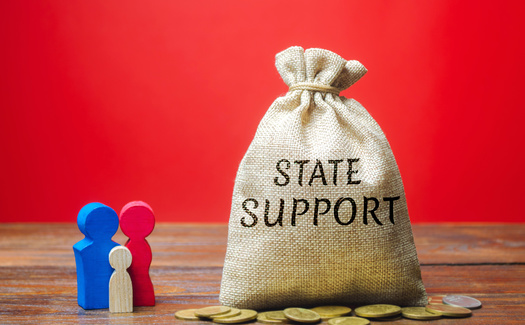 Iowa's Republican leaders say the state should pursue more tax cuts with a budget surplus in hand. But some groups say that approach would end up leaving working families behind. (Adobe Stock)