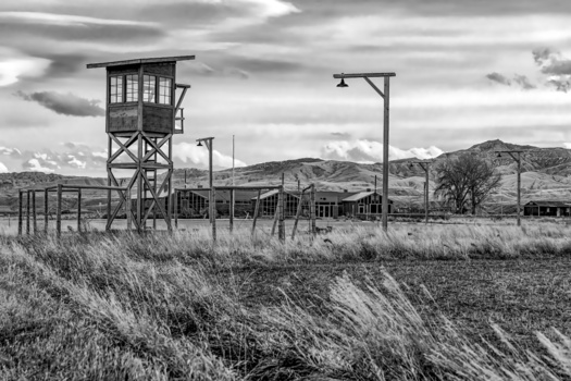 Heart Mountain internment camp's 10,000 Japanese American residents were held in a one-square-mile area surrounded by nine towers staffed by armed military police. (Adobe Stock)
