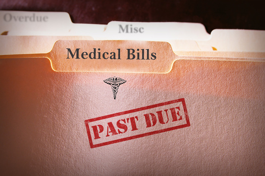 In 2020, nearly one in five Americans reported some level of medical debt. (zimmytws/Adobe Stock)